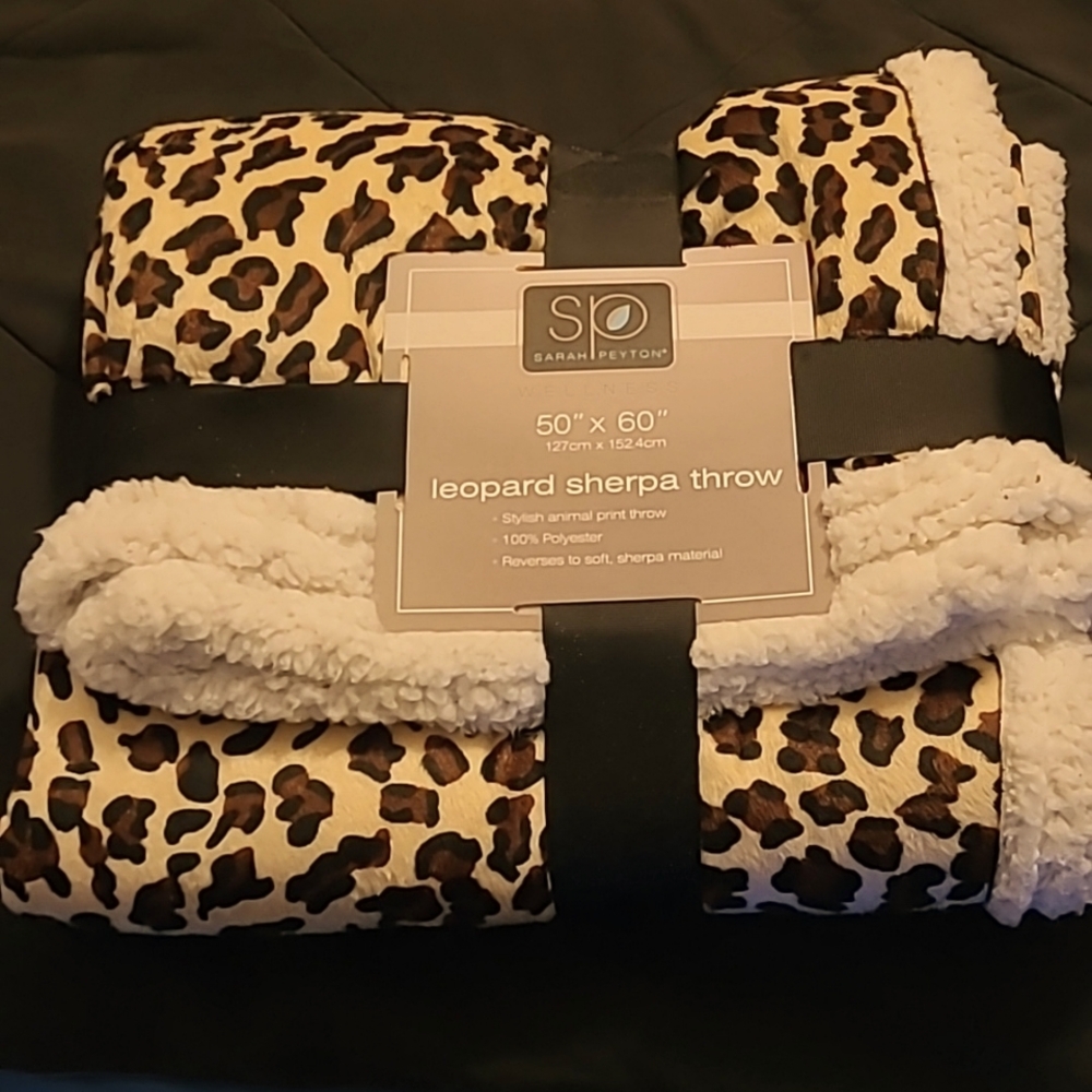 Leopard sherpa throw 50" × 60" in. Soft and fluffy, very pretty